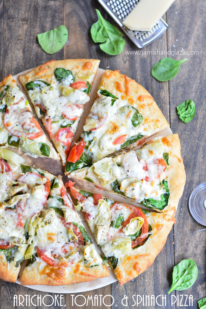 Go meatless with this veggie topped Artichoke, Tomato, and Spinach Pizza made on a No Knead, No Rise Pizza Dough crust.