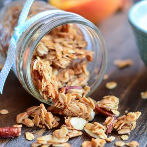 Crunchy homemade vanilla granola with almonds and pecans is the perfect snack to munch on or throw in your yogurt.