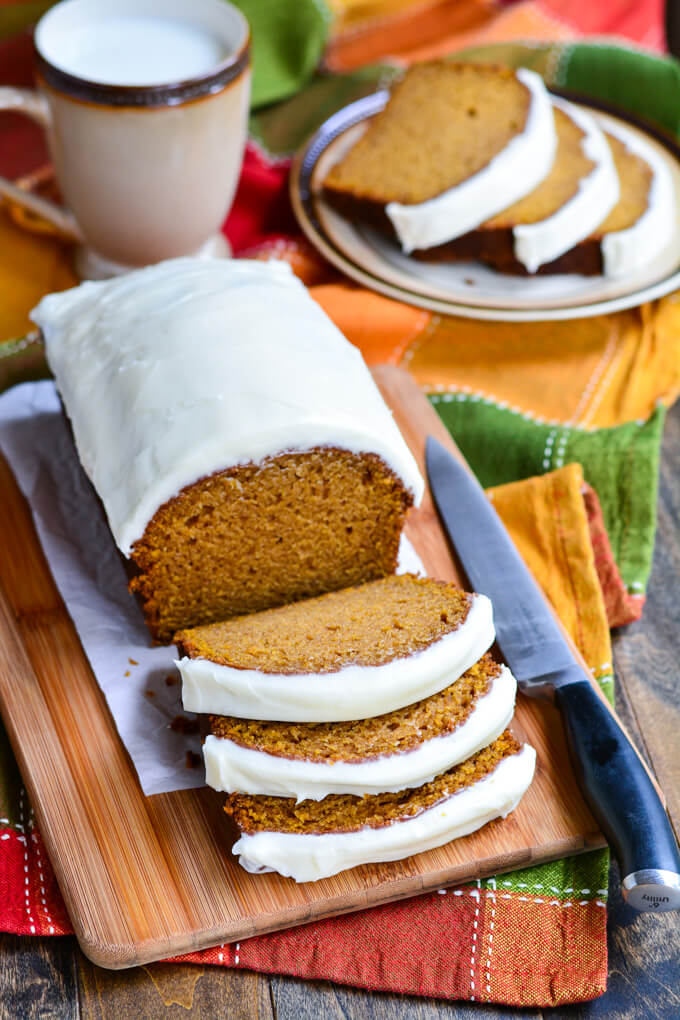 This Moist Pumpkin Bread topped with Cream Cheese Frosting is the best way to enjoy pumpkin this fall with friends and family!