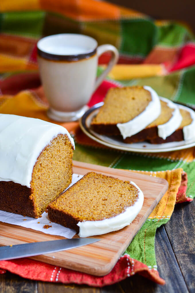 This Moist Pumpkin Bread topped with Cream Cheese Frosting is the best way to enjoy pumpkin this fall with friends and family!