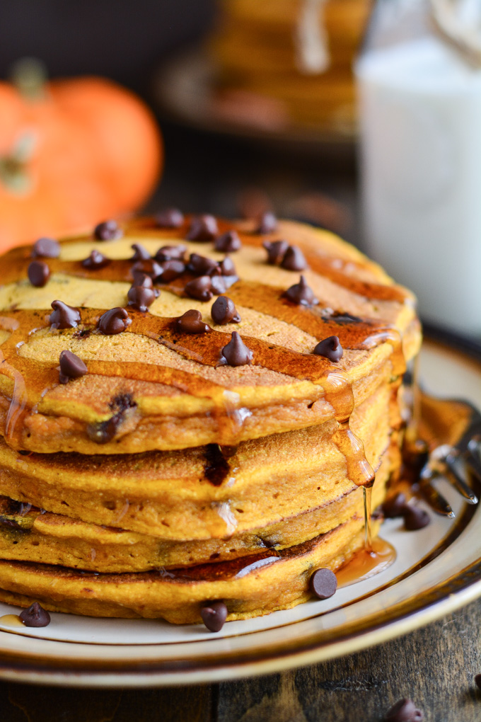 A stack of Chocolate Chip Pumpkin Pancakes topped with mini chocolate chips...