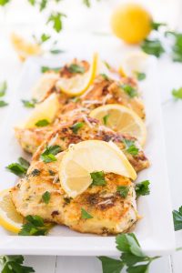 Chicken Francais is moist and tender thinly pounded chicken that is pan-seared and served with a buttery lemon sauce on top.