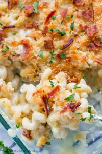 5 Cheese Mac & Cheese topped with extra cheese, Panko, and bacon is the ultimate comfort food!