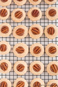 Turtle Snickerdoodles are soft cinnamon cookies topped with chocolate caramel Rolos and a pecan. Perfect for your Christmas cookie plate!