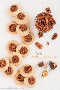 Turtle Snickerdoodles are soft cinnamon cookies topped with chocolate caramel Rolos and a pecan. Perfect for your Christmas cookie plate!