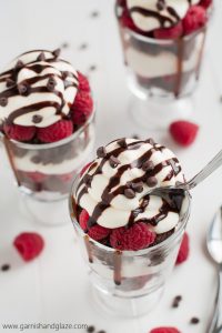 Nothing says "love" like these Raspberry Cheesecake Trifles made with rich chocolate from-scratch chocolate chip brownies, easy no-bake cheesecake filling, and fresh sweet raspberries.