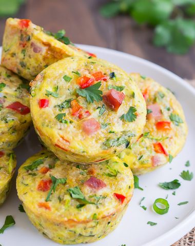 These veggie packed, high protein Mini Zucchini Quinoa Frittatas are perfect for Sunday brunch or an easy grab-and-go healthy breakfast.