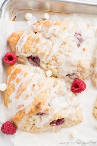 Serve White Chocolate Raspberry Scones at your next Sunday brunch for a super light and tender scone that no one will be able to stop talking about.