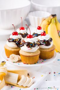 Delight in the delicious flavors of your favorite ice cream dessert in these Banana Split Cupcakes topped with smooth buttercream, rich ganache, and a cherry on top.