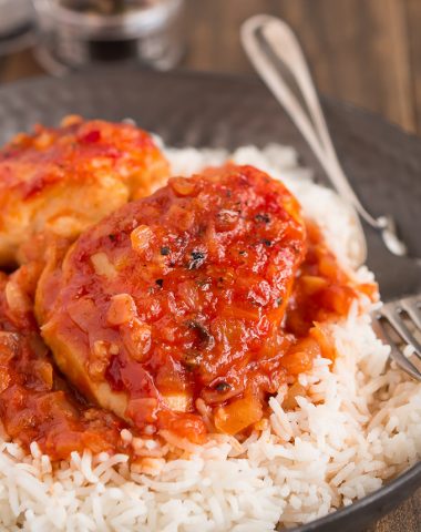 Napa Valley Chicken is baked in a sweet and savory tomato, onion, and garlic sauce and is one of my absolute favorite recipes from my childhood.