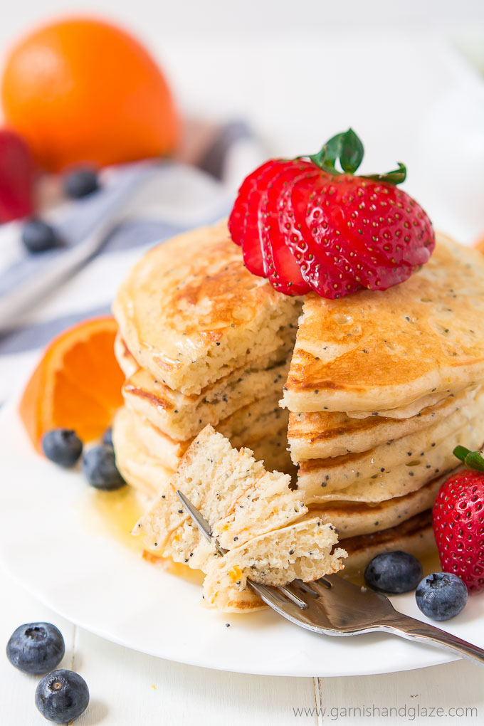 Your weekends just got a whole lot better with these Orange Poppy Seed Pancakes. Top with fresh berries and Orange Syrup and you'll be in heaven.