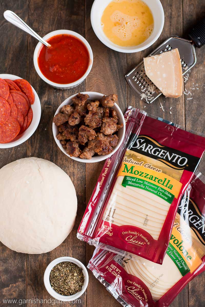 Calling all meat & cheese lovers! This Sausage & Pepperoni Stromboli is for you! Warm meat and melted cheese all wrapped up in seasoned pizza dough.
