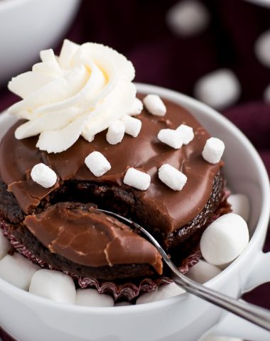 'Tis the season to wrap yourself up in a blanket next to the fireplace with one of these rich and fluffy Hot Chocolate Cupcakes in hand.