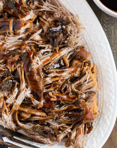 Impress your guests at your next dinner party with this flavorful Balsamic Glazed Slow Cooker Pork Loin that requires almost no effort.