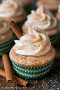 Enjoy your favorite childhood cookie in cupcake form with these soft and fluffy cinnamon sugar Snickerdoodle Cupcakes topped with cream cheese frosting.