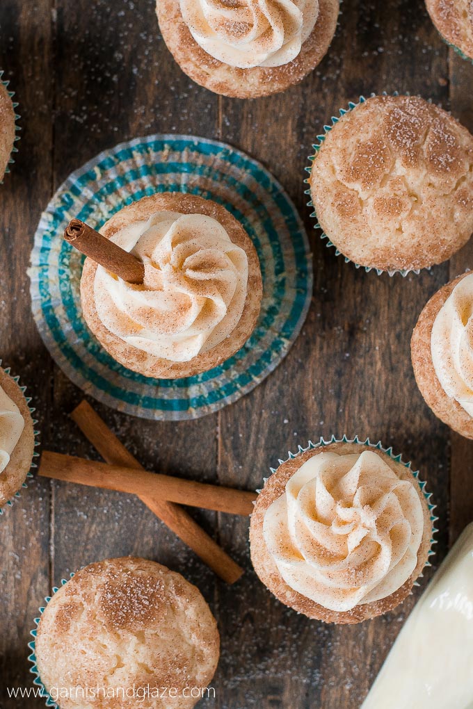 Enjoy your favorite childhood cookie in cupcake form with these soft and fluffy cinnamon sugar Snickerdoodle Cupcakes topped with cream cheese frosting.