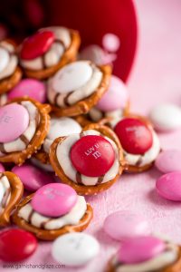 It takes just three ingredients to throw together these perfectly cute, extremely easy, and super yummy Valentine Pretzel Hugs.