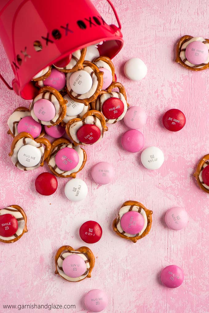 It takes just three ingredients to throw together these perfectly cute, extremely easy, and super yummy Valentine Pretzel Hugs.