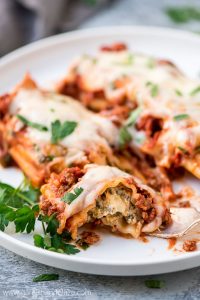 Easy Beef, Spinach, and Cheese Manicotti is a fancy pasta dish made simple. You don't have to precook the noodles so it's way easier and less time consuming.