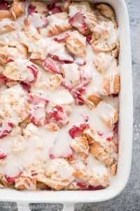 Use up your french bread in this scrumptious STRAWBERRIES AND CREAM BREAD PUDDING topped with the most delicious creamy glaze.