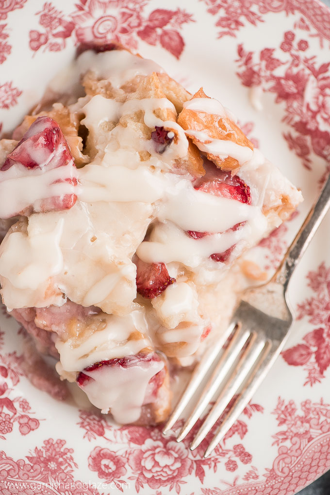 Enjoy your favorite berry in this scrumptious STRAWBERRIES AND CREAM BREAD PUDDING topped with the most delicious creamy glaze. 