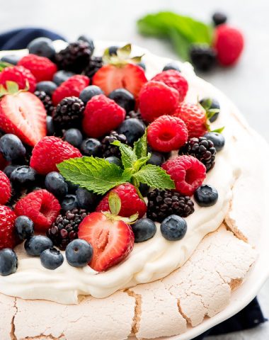 Mixed Berry Pavlova is the perfect summer party dessert! It's simple, beautiful, refreshing, and a definite crowd pleaser.