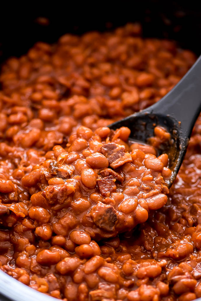 Slow Cooker Baked Beans are a delicious and easy made-from-scratch side dish that tastes fantastic next to your favorite burger.