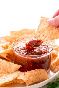 If there is one condiment that is worth making, it's Homemade Salsa. Just pop the veggies in the oven to roast and blend them up.