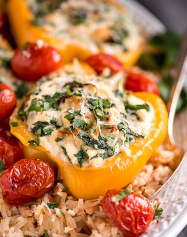 Enjoy these easy-to-make Spinach Ricotta Stuffed Peppers with Blistered Tomatoes for a beautiful and healthy vegetarian meal.
