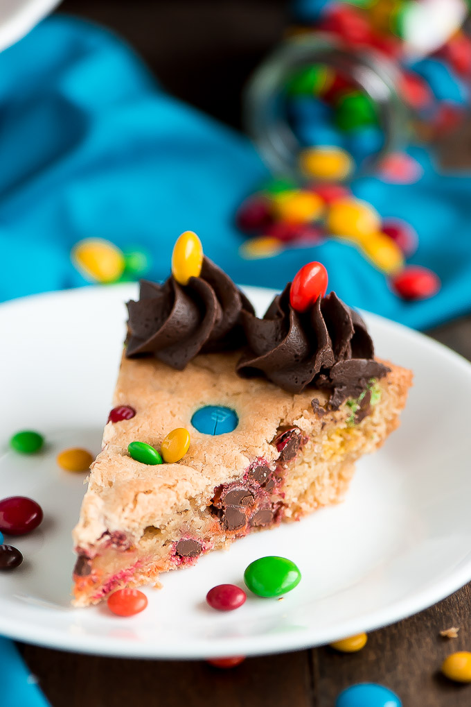 One plated slice of Chew M&M Cookie Cake