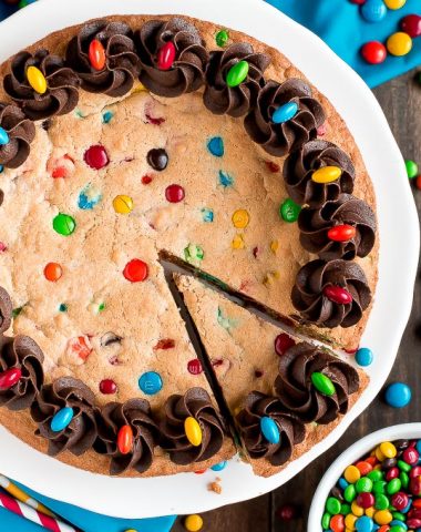 Whether you're celebrating a birthday or just want something sweet, this candy loaded Chewy M&M COOKIE CAKE is a dessert you must try.