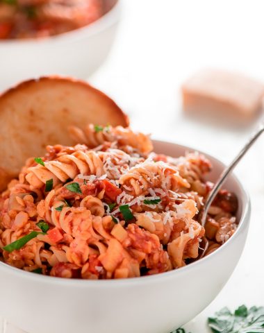 Stay within your food budget without sacrificing protein. This Red Lentil Mushroom Ragu is full of protein and fiber and packed with flavor. 