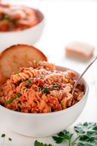 Stay within your food budget without sacrificing protein. This Red Lentil Mushroom Ragu is full of protein and fiber and packed with flavor. 