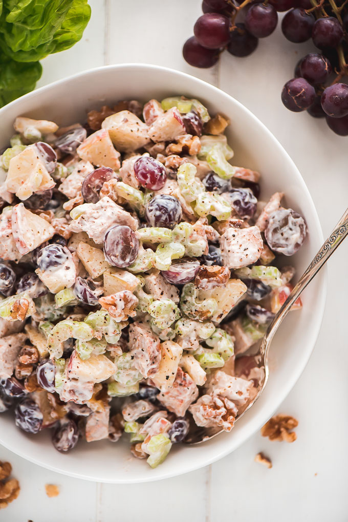 Chicken Waldorf Salad all mixed together in a bowl ready to serve.