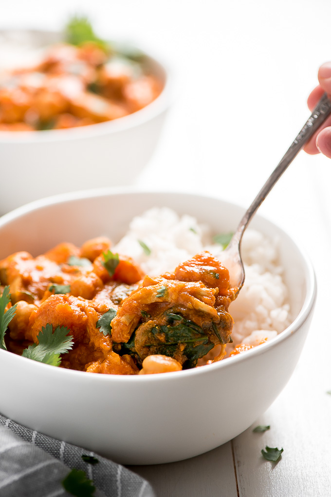 A spoonful of Indian Chicken Curry made with coconut milk.