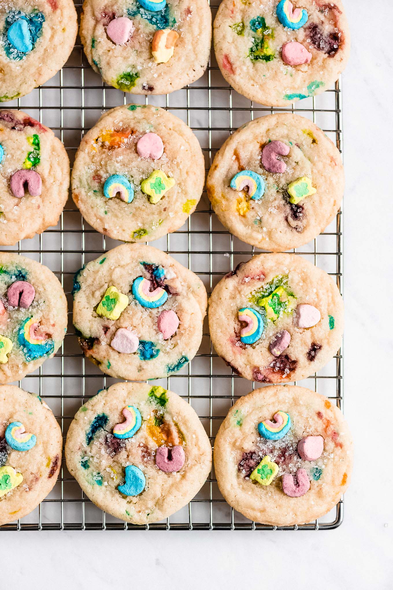 Lucky Charms Cookies on a cooling rack.
