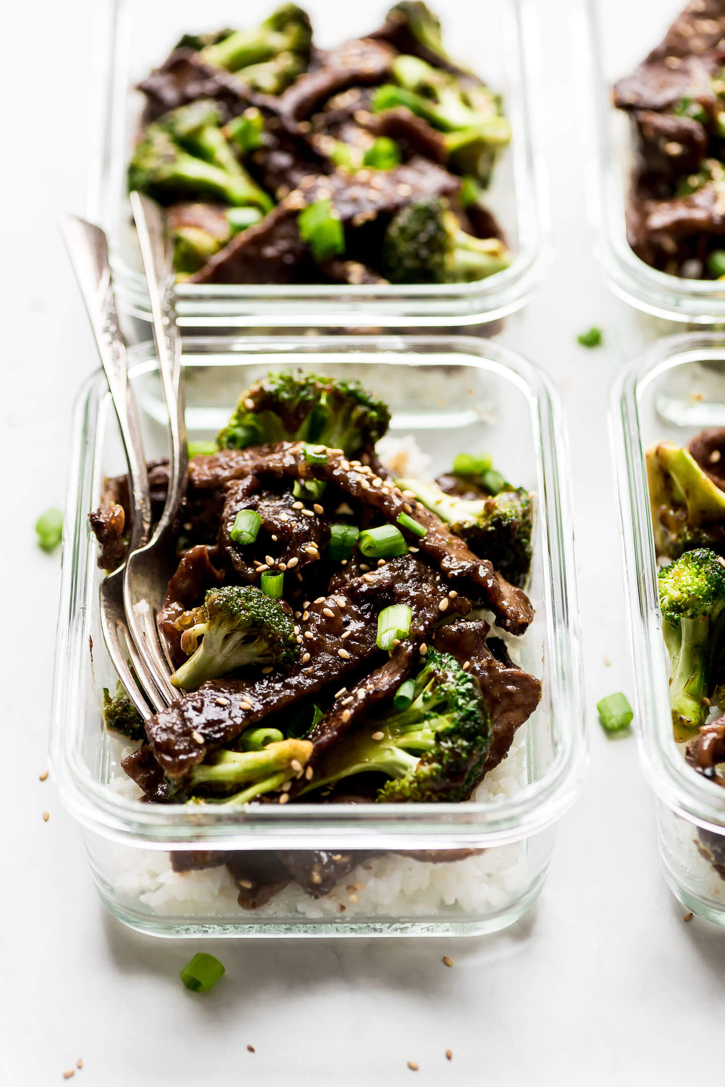 A close up photo of Beef and Broccoli Stir Fry in a meal prep container.