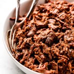 A large serving bowl of shredded Beef Barbacoa.