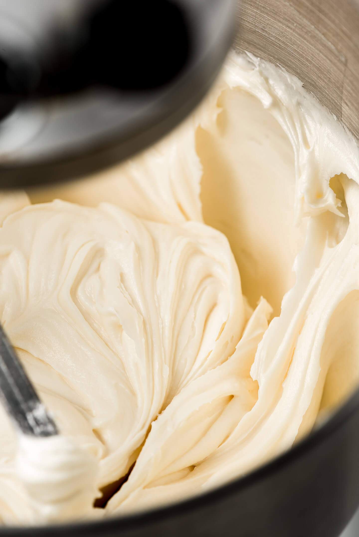 Cream Cheese Frosting in the bowl of a Kitchen Aid mixer.