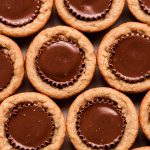 Top view of many Peanut Butter Cup Cookies pressed close to each other.