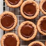 Reese's Peanut Butter Cookies on a cooling rack.