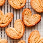 Palmier Cookies on a cooling rack.