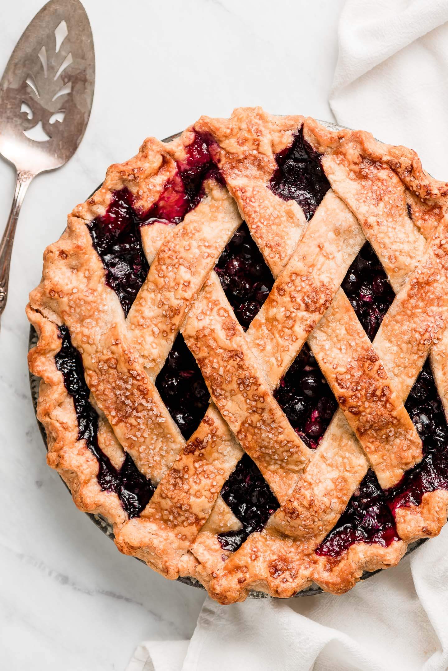 Cooked blueberry pie with a lattice top.