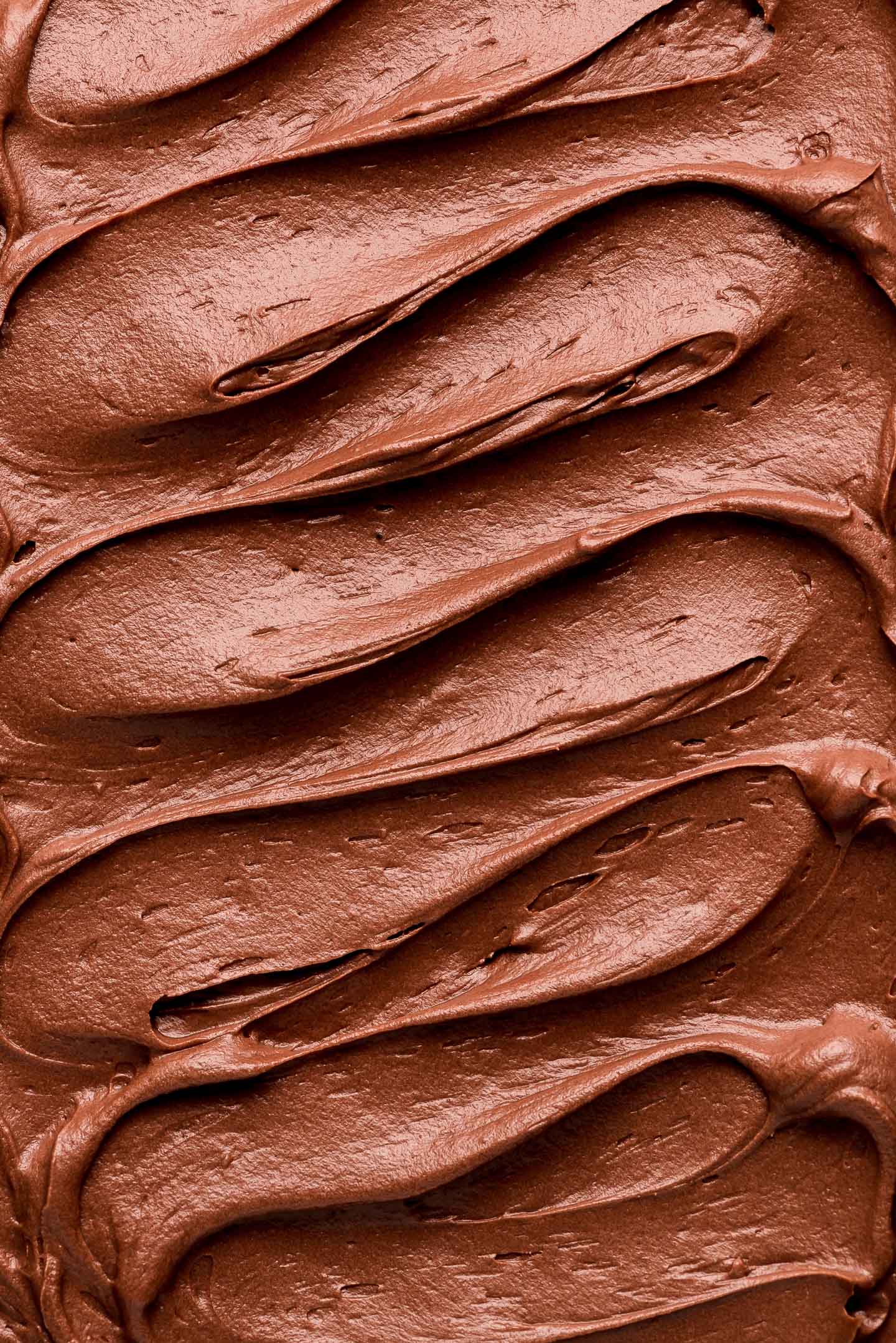 Ripples of Chocolate Cream Cheese Frosting.