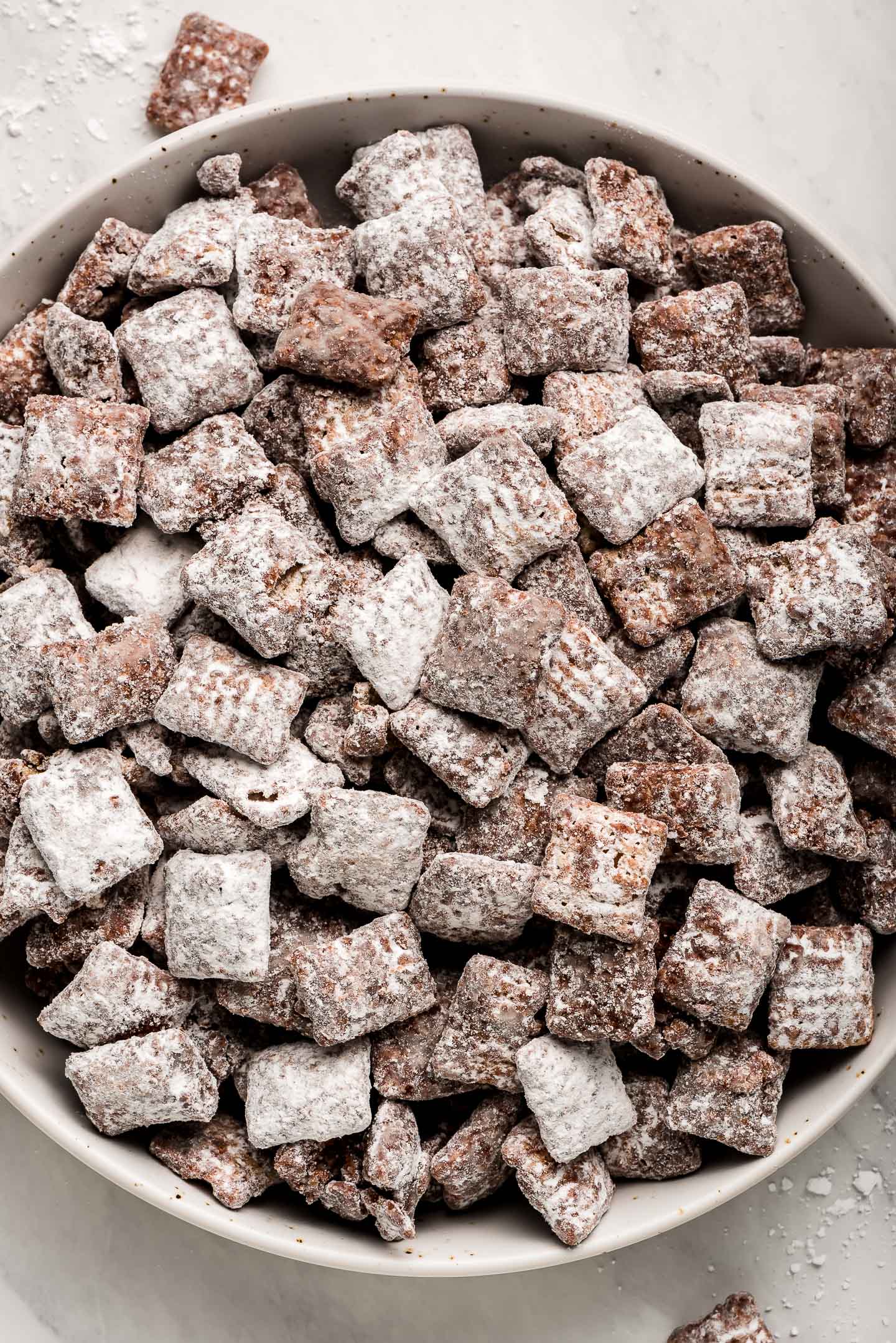 Close up of Puppy Chow in a bowl.