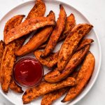 Roasted Sweet Potato Wedges on a plate.
