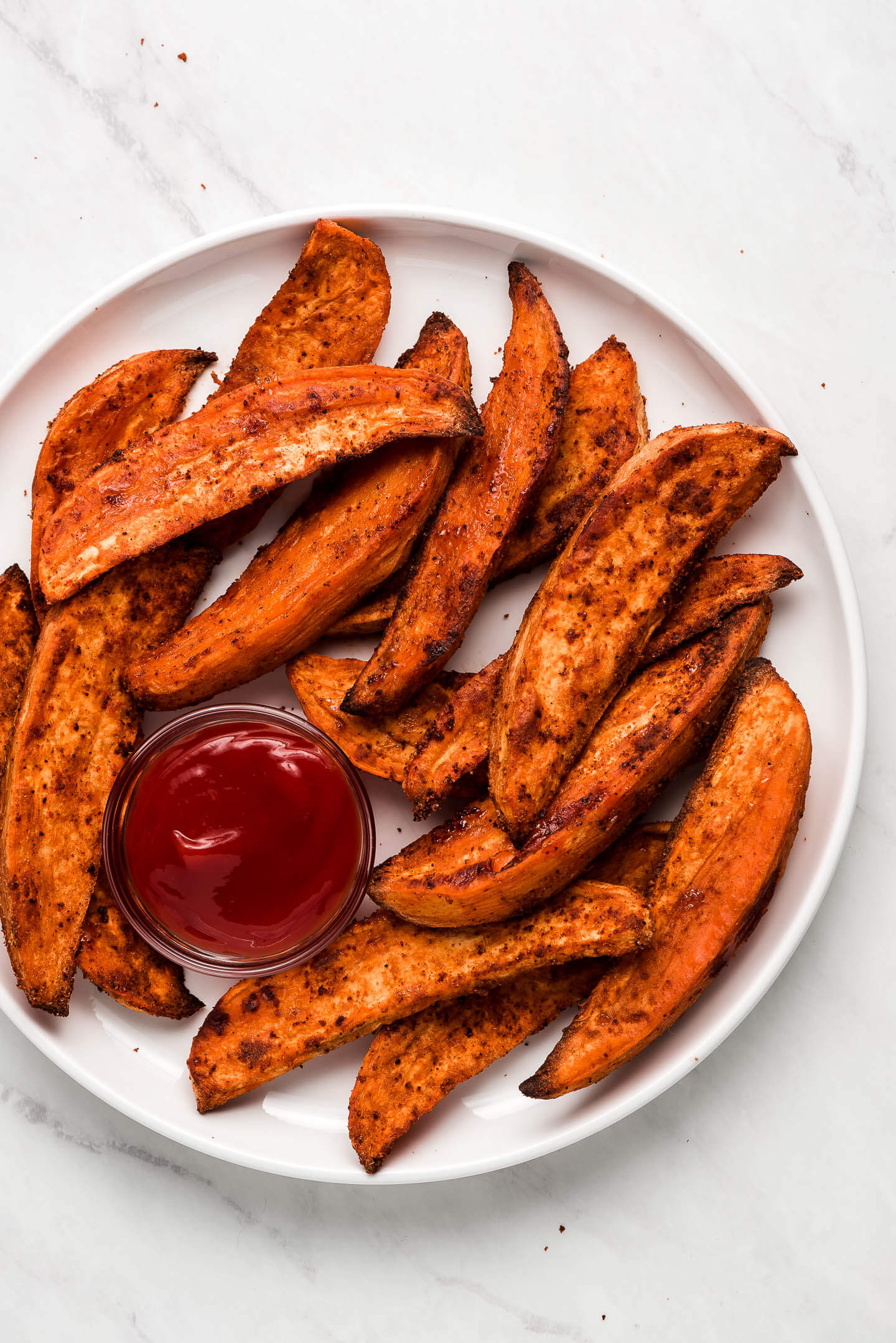 Roasted Sweet Potato Wedges on a plate.