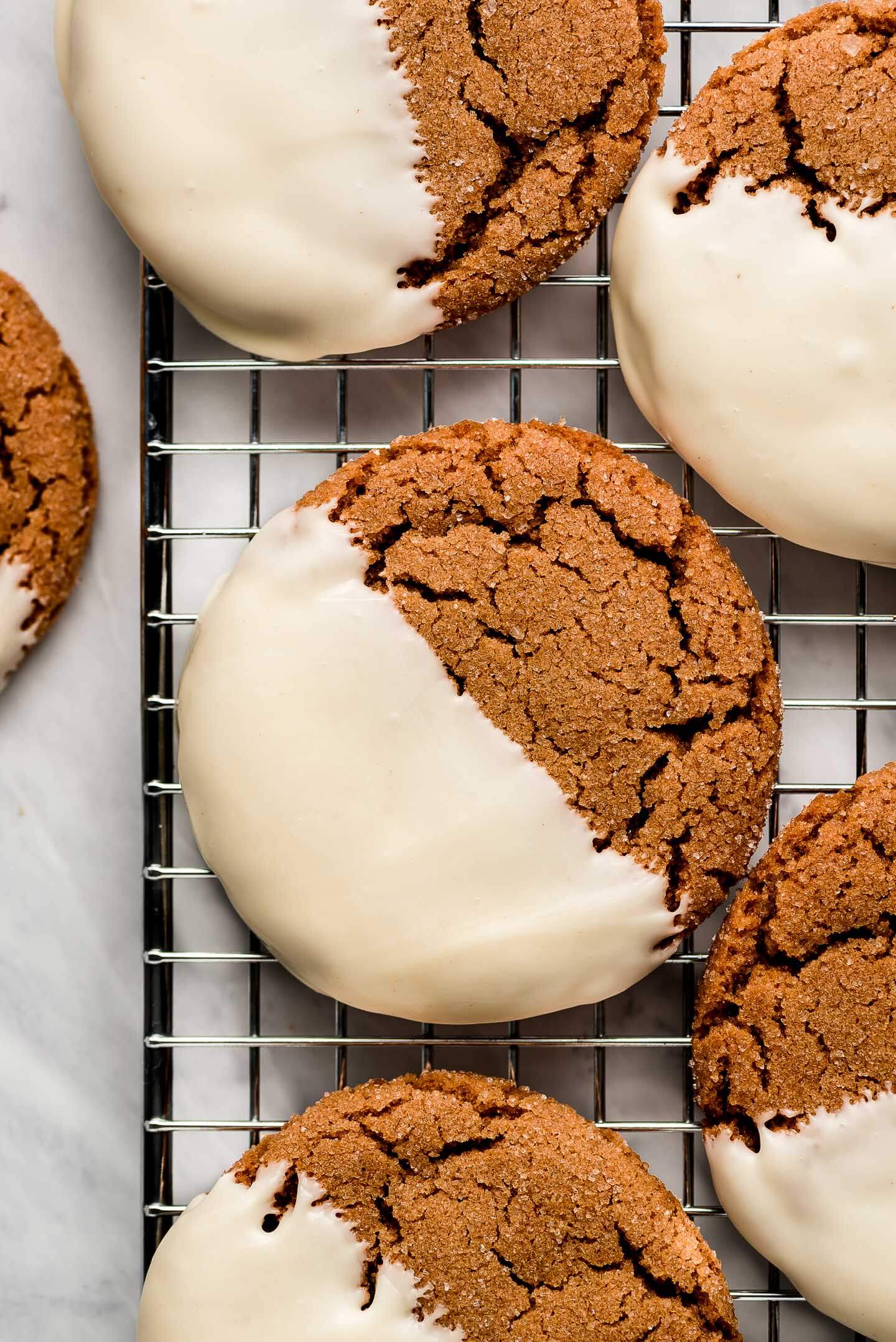 Close up shot of a White Chocolate Dipped Gingersnap Cookie.