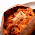 Baked Sweet Potato topped with brown sugar, cinnamon and a pat of butter.
